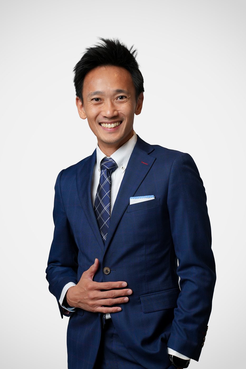 LinkedIn headshot Singapore — formal executive portrait in suit at The Portrait Room