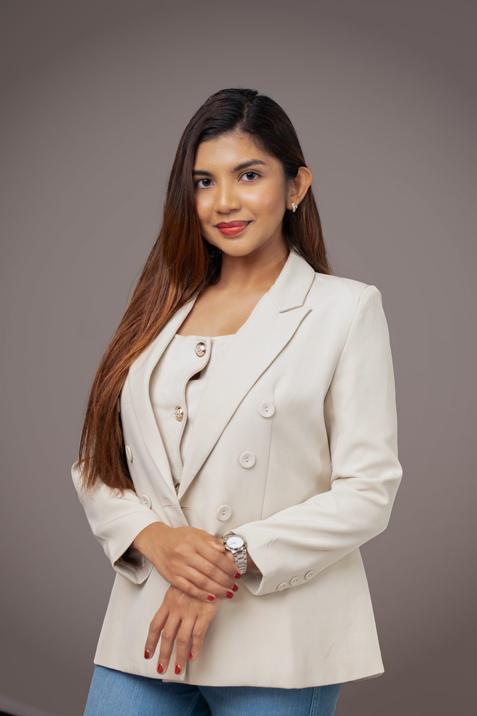 Professional headshot Singapore — female corporate portrait in white blazer