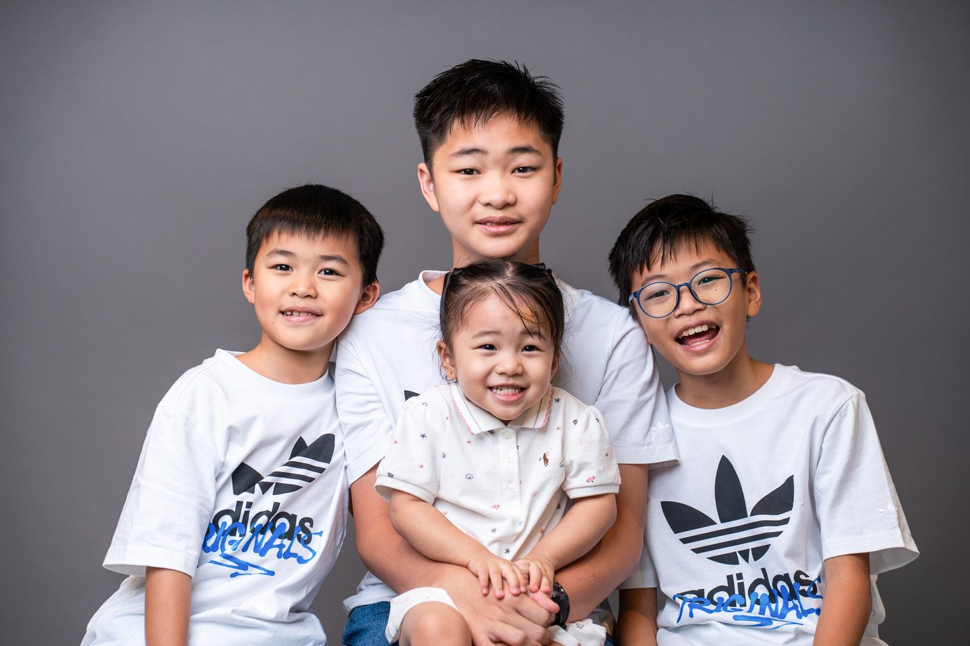 Children portrait photography Singapore — siblings family studio session