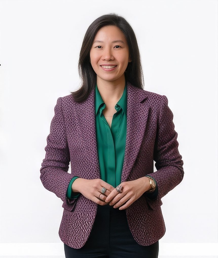 Woman in a purple textured blazer with green blouse for a creative LinkedIn headshot