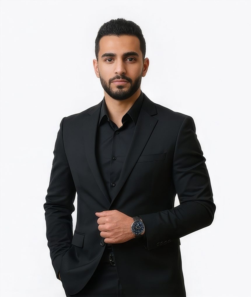 Man in a black shirt and blazer for a finance LinkedIn headshot