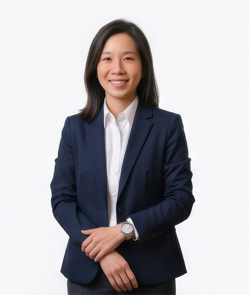Woman in a navy blazer and white shirt for a finance LinkedIn headshot
